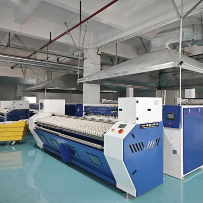 工业洗涤高峰季产能提升方案 - 广屹智能送布机实战案例解析